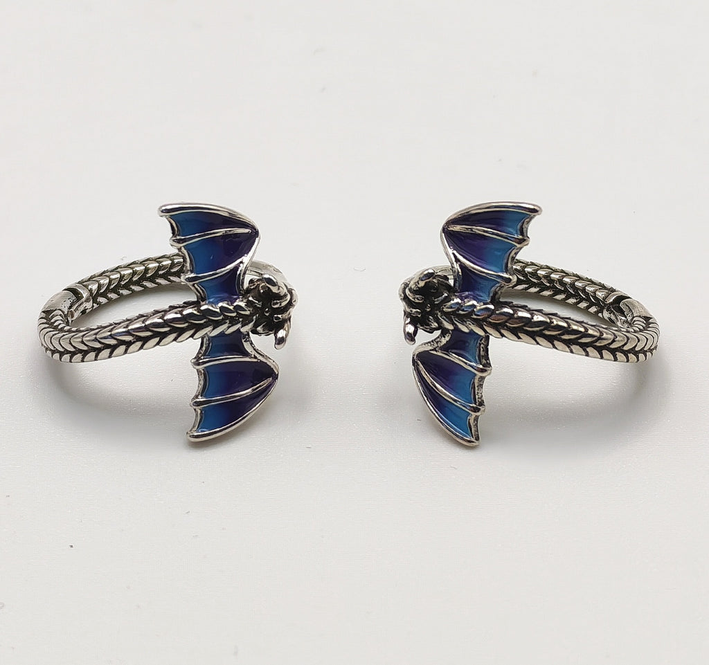 Pair of fantasy dragon hoop earrings in sterling silver with sculpted dragon design