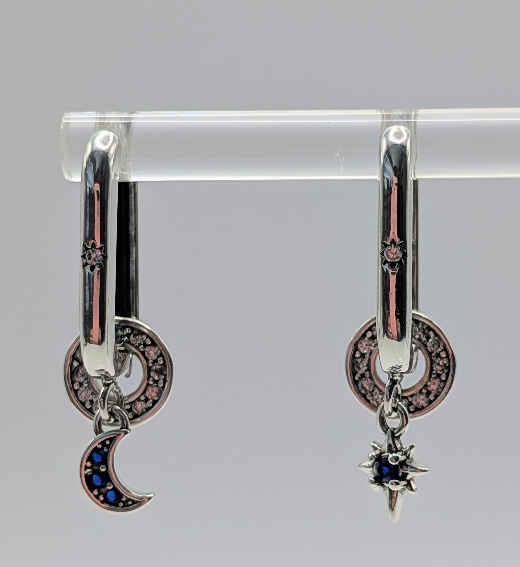 Sun star charm with blue stone on sterling silver celestial hoop earring