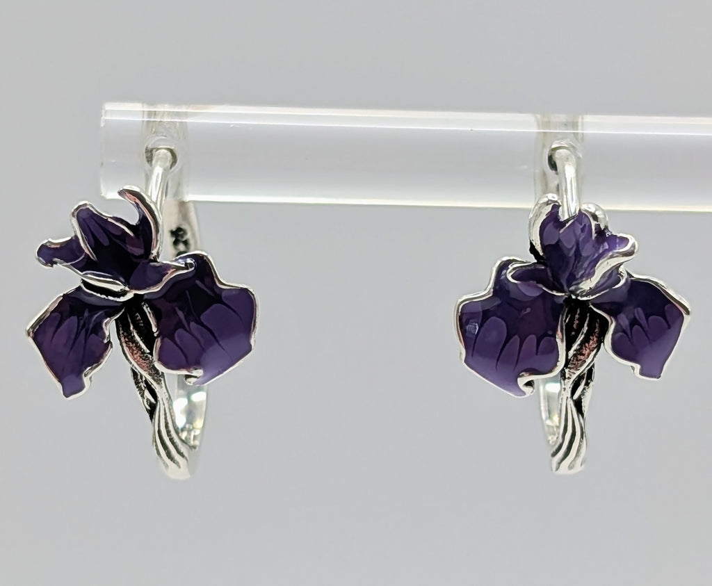 Purple enamel iris flower charm on sterling silver hoop earring.