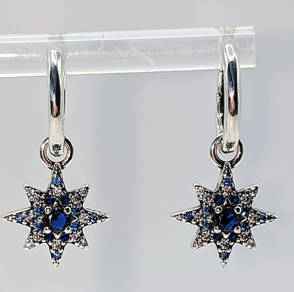 Sterling silver star drop hoop earrings with blue and clear zirconia