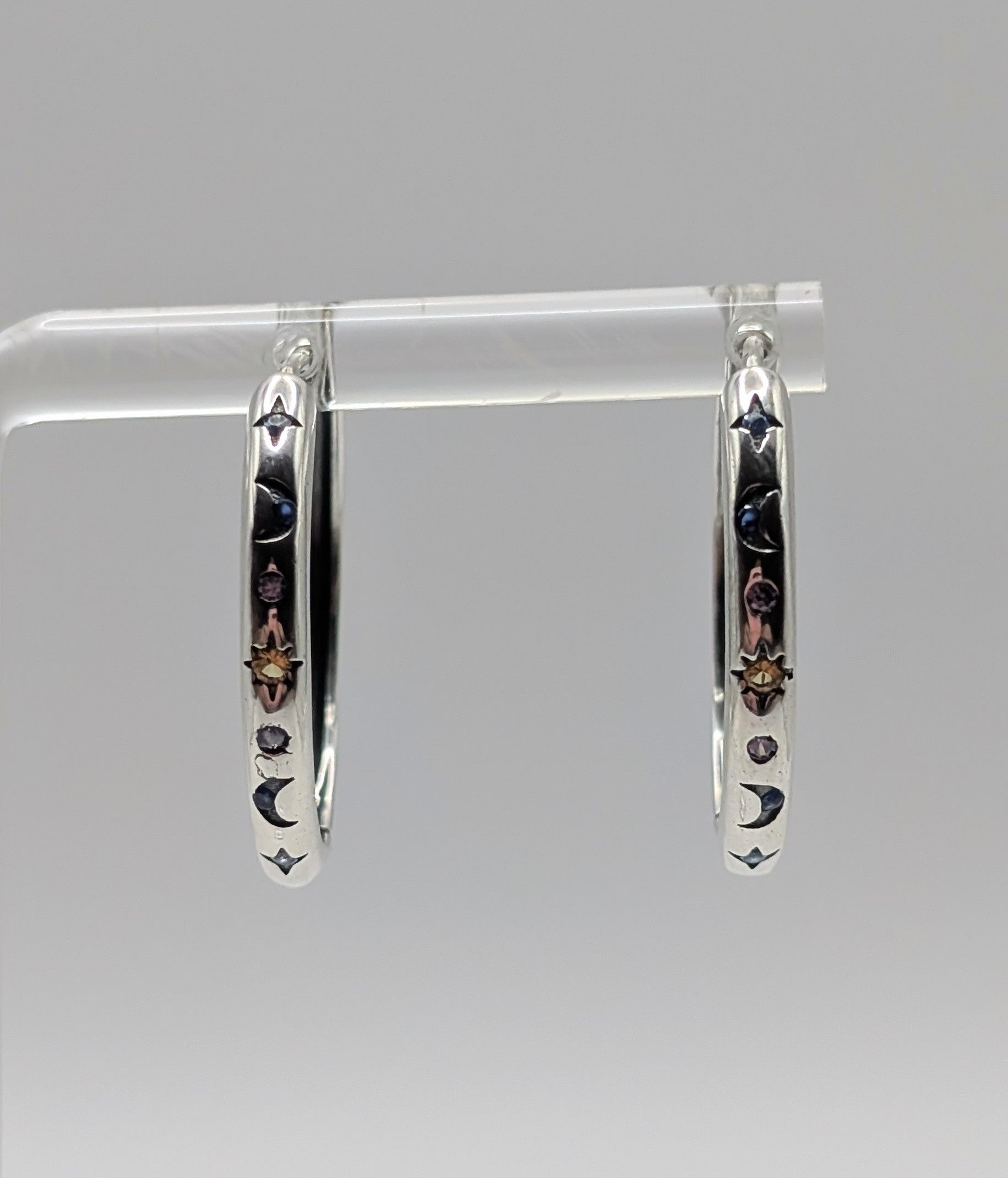 Sterling Silver Mid-sized Moon and Star Hoop Earrings with Clear, Blue & Orange Zirconia's