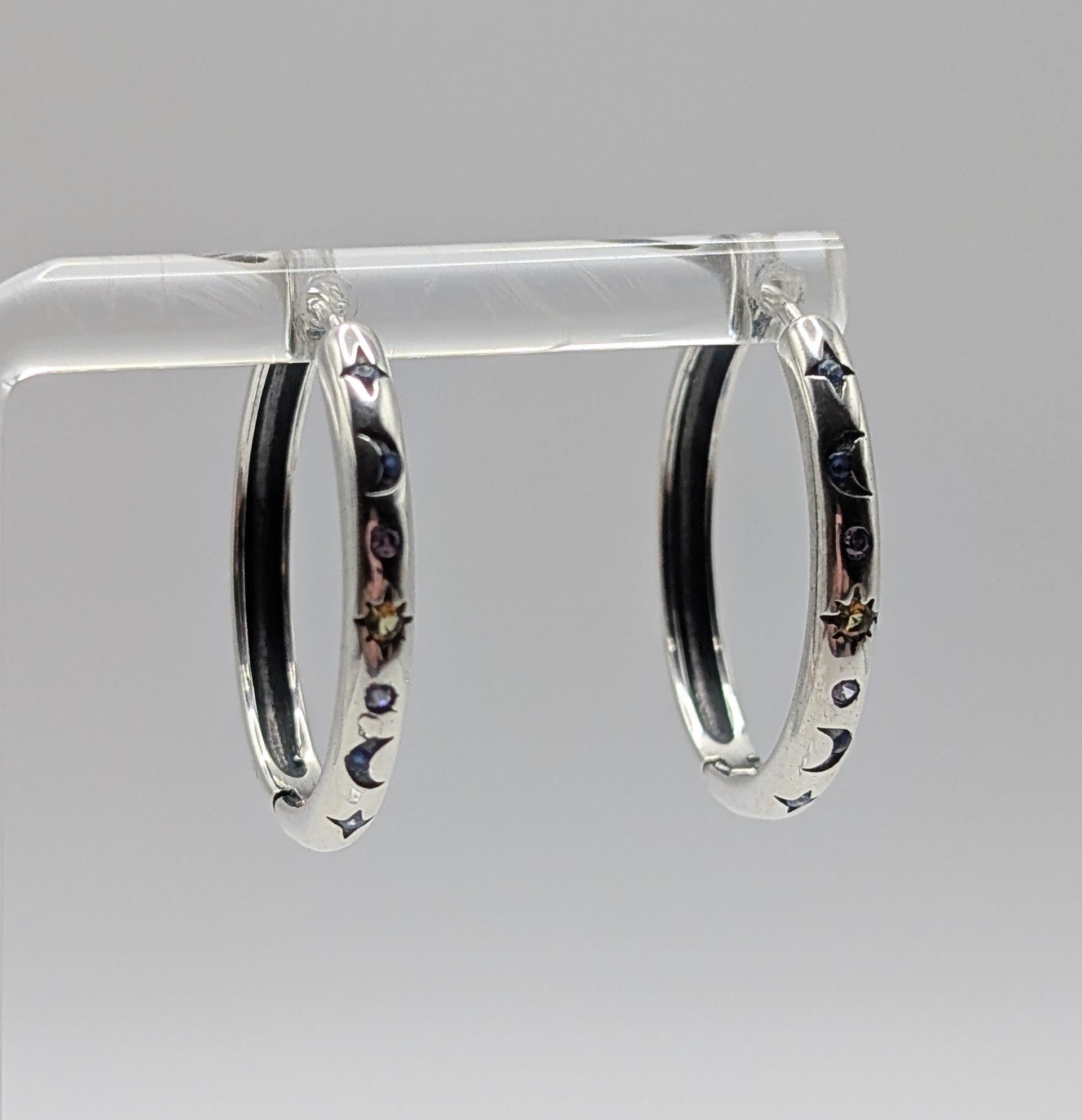 Sterling Silver Mid-sized Moon and Star Hoop Earrings with Clear, Blue & Orange Zirconia's