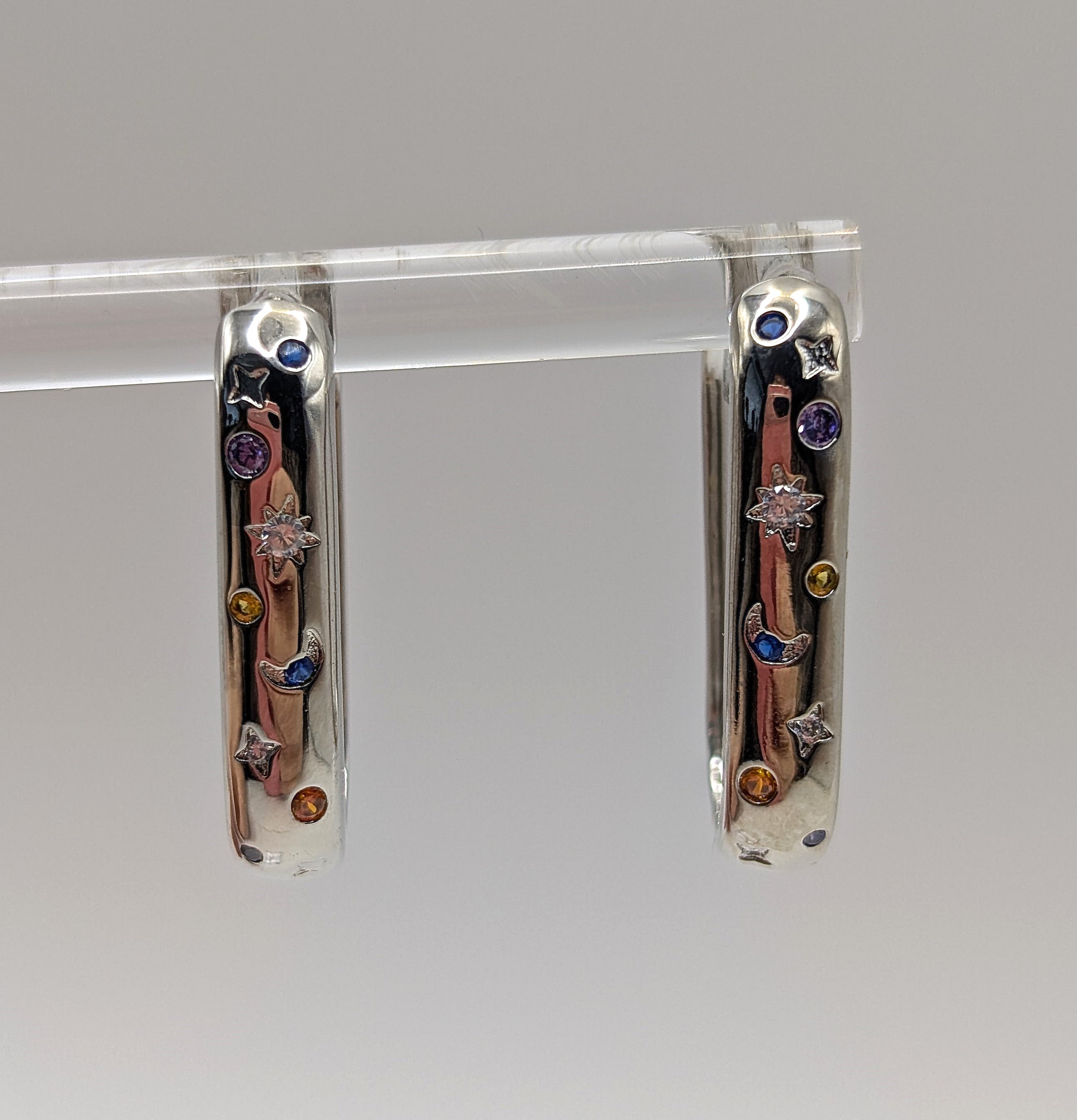 Sterling Silver Moon & Star Oblong Hoop Earrings with Blue, Clear and Orange Zirconia Stones