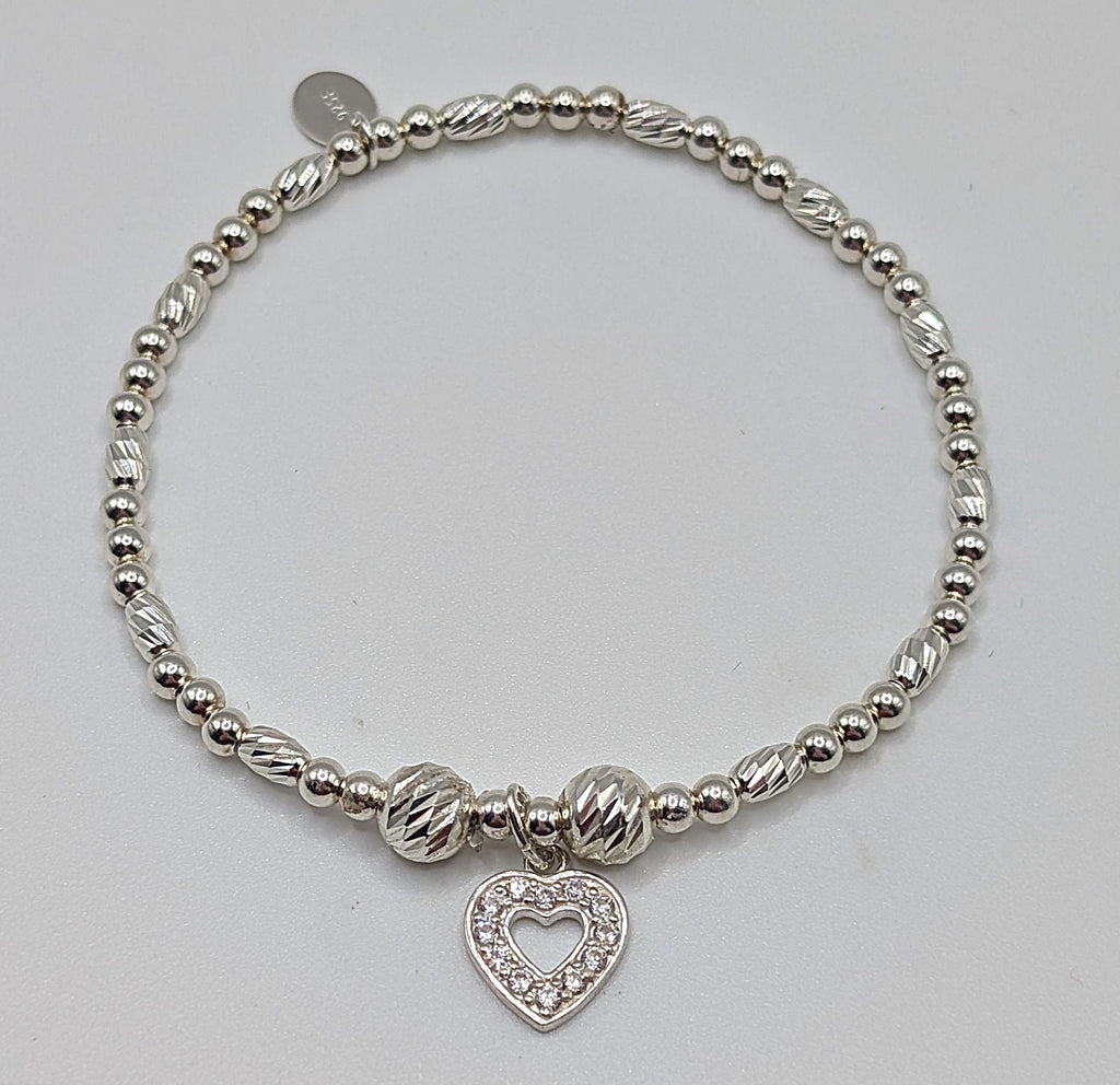 Set of two pretty sterling silver stretch handmade bracelets with heart charms