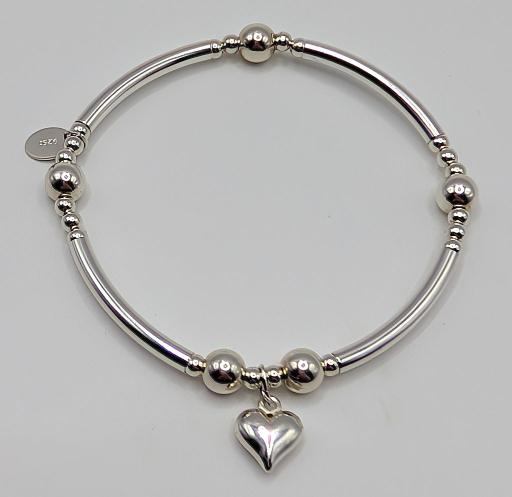 Set of two pretty sterling silver stretch handmade bracelets with heart charms