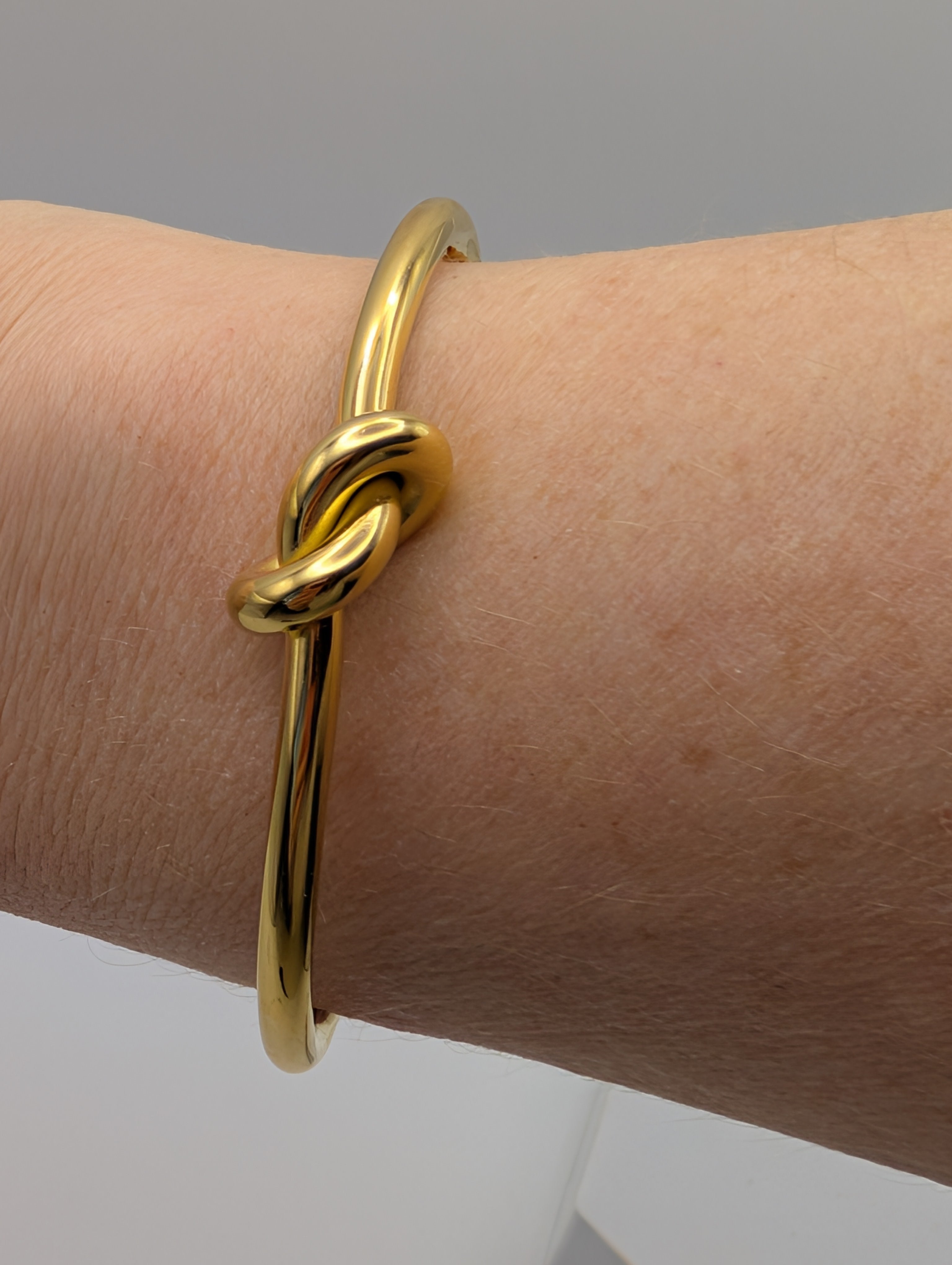 Stainless Steel Gold-Plated Knot Cuff and Matching Knot Hoop Earrings