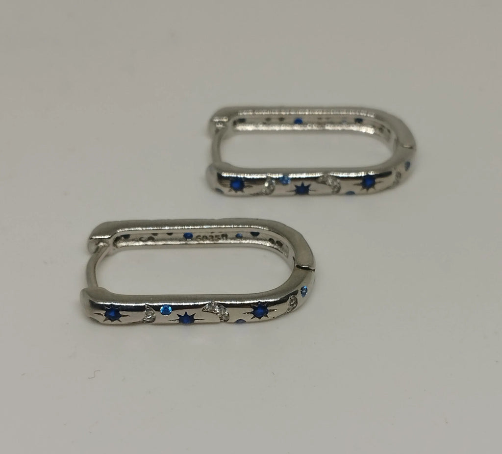 Sterling Silver Oblong Hoop Earrings with Moon Star Pattern And Blue Clear Zirconia Stones